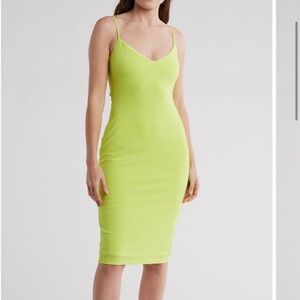 BRAND NEW! Midi length.